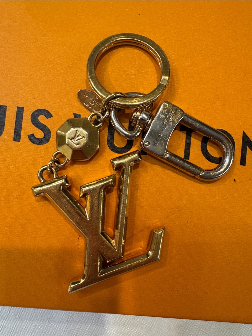 Authentic Louis Vuitton Gold Metal LV Logo Key Charm